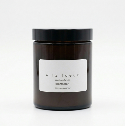 Amber soy candle in amber glass jar with black lid, scented with cashmeran